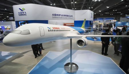 A mockup of jumbo jet C919, the major project of the Commercial Aircraft Corporation of China (COMAC), is displayed at the Asian Aerospace '09 in Hong Kong, China, Sept. 8, 2009.[Zhou Lei/Xinhua]