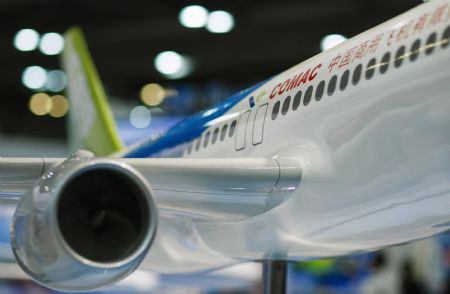 A mockup of jumbo jet C919, the major project of the Commercial Aircraft Corporation of China (COMAC), is displayed at the Asian Aerospace '09 in Hong Kong, China, Sept. 8, 2009. [Zhou Lei/Xinhua]