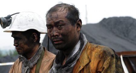 Succors walk at the Xinhua No. 4 coal mine in Xinhua District of Pingdingshan City, central China's Henan Province, on Sept. 8, 2009.[Zhaojiuyuan Peng/Xinhua]