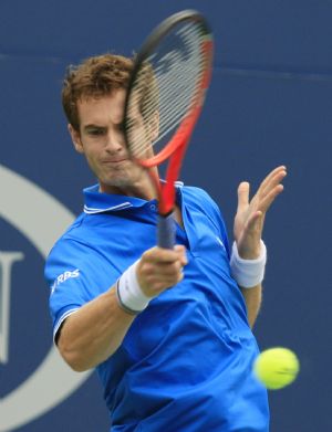 Andy Murray of Britain hits a return shot to Marin Cilic of Croatia during their match at the U.S. Open tennis championship in New York, September 8, 2009.