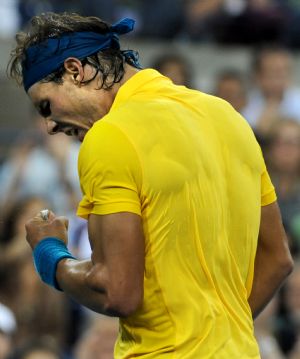 Rafael Nadal of Spain celebrates one point during the men's singles 4th round match against Gael Monfils of France at the U.S. Open tennis tournament in New York, the U.S., Sept. 8, 2009. (Xinhua/Shen Hong) 