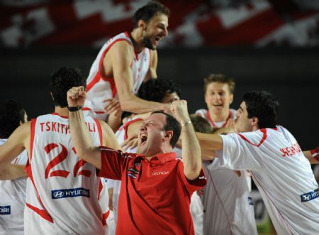 Team of Georgia celebrates after winning the promotion round match against Belarus at the FIBA EuroBasket 2009 in Tbilisi, capital of Georgia, Sept. 9, 2009. Georgia defeated Belarus by 86-84. [Xinhua]