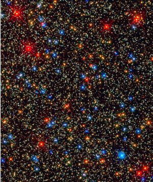 This NASA handout image taken by NASA's Hubble Space Telescope shows a panoramic view of a colorful assortment of stars residing in the crowded core of a giant star cluster. A fully rejuvenated Hubble telescope kicked off its new life on Sept. 9 with a flurry of stunningly clear images of cosmic wonder, including a celestial 'butterfly' and a 'pillar of creation. '[Xinhua/AFP]