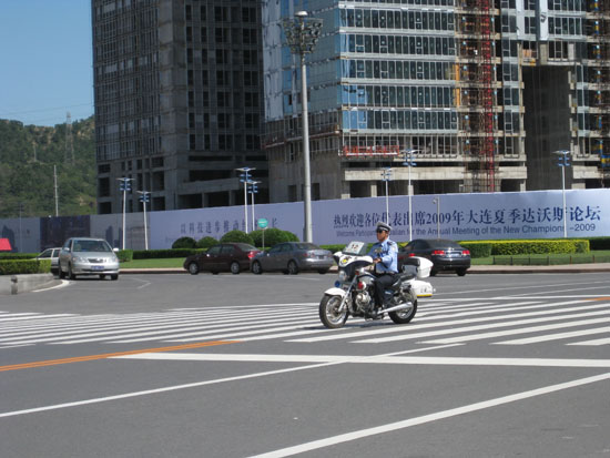 Police patrolling near the Conference Building [Catherine Guo / China.org.cn]