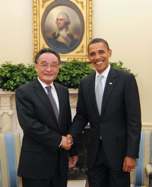  Wu Bangguo (L), chairman of the Standing Committee of China's National People's Congress, meets with U.S. President Barack Obama at the White House in Washington, the United States, Sept. 10, 2009. 