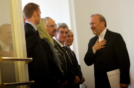 Iran's Foreign Minister Manouchehr Mottaki (1st R) meets with the four ambassadors of China, Russia, France and Germany, the British charge d'affaires, and the Swiss envoy representing the United States, in Teheran, Iran, Sept. 9, 2009. Iran handed over its new package of proposals to representatives of major powers involved in talks over its nuclear program on Wednesday. (Xinhua Photo)
