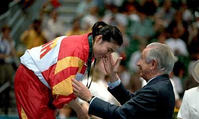 President of IOC, Samaranch presented the prize for Deng at 1996 Atlanta Olympic Games.