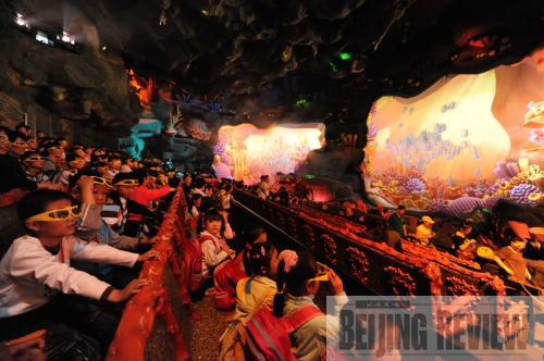 Children watch a 3-D film at the Wuhu Fangte Animation Theme Park in Anhui Province on April 28. 