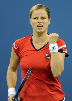 Kim Clijsters of Belgium reacts during her semi-final match against Serena Williams at the U.S. Open tennis tournament in New York September 12, 2009.