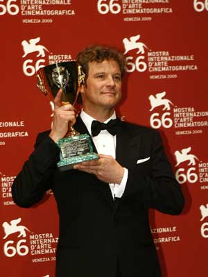 British actor Colin Firth shows the Best Actor award for his role in the film 'A Single Man' during the 66th Venice International Film Festival at Venice Lido, Italy, on Sept. 12, 2009.