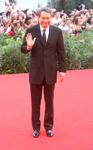 Jury's president Ang Lee walks on the red carpet before the closing ceremony of the 66th Venice International Film Festival at Venice Lido, Italy, on Sept. 12, 2009.