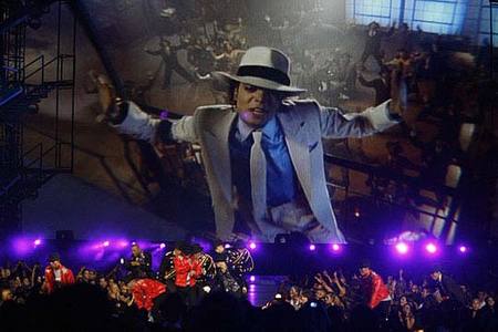 A Michael Jackson video is played at the start of the MTV Music Video Awards, Sunday, Sept. 13, 2009 in New York.