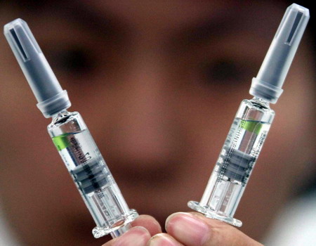 A/H1N1 flu vaccine is formally put into production by China's domestic pharmaceutical company Sinovac Biotech Ltd., also known as Beijing Kexing Bioproducts, Sep.3, 2009. The State Food and Drug Administration (SFDA) issued the license for Sinovac's vaccine called Panflu.1, after it passed SFDA's experts evaluation on August 31. [Xinhua] 