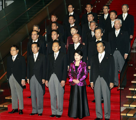 Japan's newly elected Prime Minister Yukio Hatoyama (C, 1st row)and his cabinet including Foreign Minister Katsuya Okada (1st R, 1st row), Minister of State Strategy and vice Prime Minister Naoto Kan (2nd L, 1st row), Chief Cabinet Secretary Hirofumi Hirano (1st R, 2nd row) and Finance Minister Hirohisa Fujii (2nd R, 2nd row) pose for group photo at the prime minister's official residence in Tokyo on Sept. 16, 2009. Democratic Party of Japan (DPJ) President Yukio Hatoyama was elected as Japan's 93rd prime minister on Sept. 16. Hatoyama's new cabinet was formally launched late Wednesday following an attestation ceremony at the Imperial Palace. 