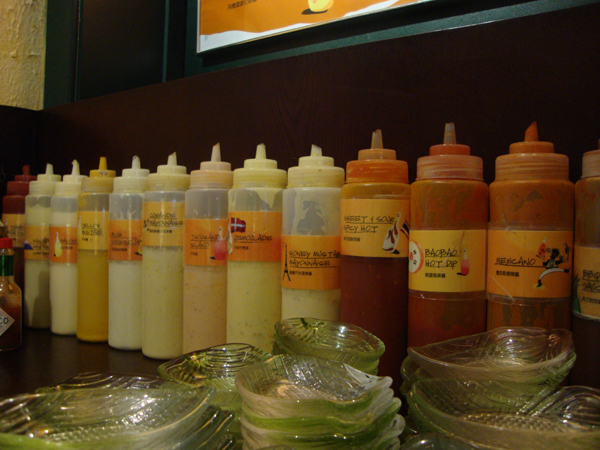 Patrons can customize their burgers and snacks with any combination of Let’s Burgers 13 sauces at its sauce bar.