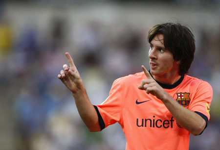 Barcelona's Lionel Messi celebrates after scoring a goal against Getafe during their Spanish first division match at the Coliseum Alfonso Perez stadium in Getafe, September 12, 2009. 