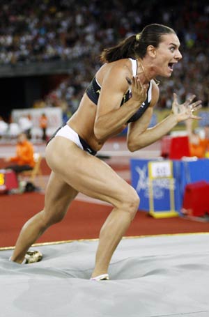 Yelena Isinbayeva of Russia reacts after her jump during the women's pole vault event at the IAAF Golden League athletics meeting at the Letzigrund stadium in Zurich Aug. 28, 2009.(Xinhua/Reuters, File Photo) 