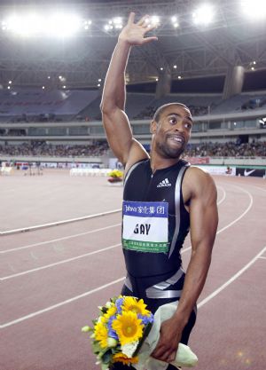Tyson Gay of the United States gestures after the men's 100m final in Shanghai Golden Grand Prix in Shanghai, China, Sept. 20, 2009.(Xinhua/Fan Jun)