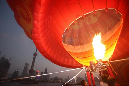 A huge hot-air balloon is raised in Shanghai, east China, Sept. 19, 2009, during a celebration of the 60th anniversary of the founding of the People's Republic of China.