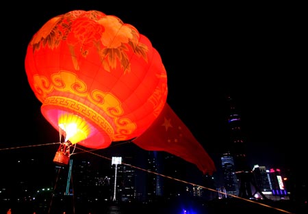 A huge hot-air balloon is raised in Shanghai, east China, Sept. 19, 2009, during a celebration of the 60th anniversary of the founding of the People's Republic of China.