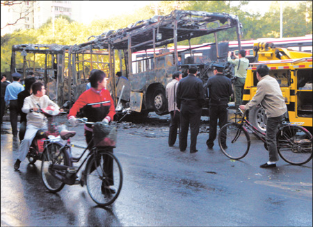 Security up after bus fire in Beijing