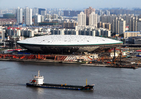 Photo taken on Sept. 20, 2009 shows the Performing Arts Center in the World Expo Park in Shanghai, east China. Construction of "one axis and four pavilions", the Axis, China Pavilion, Theme Pavilion, Performing Arts Center and Expo Center, all entered internal construction phase recently. As the landmarks of the Expo Park, "one axis and four pavilions" will become permanent buildings in post-Expo Shanghai.