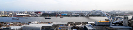 Photo taken on Sept. 20, 2009 shows the World Expo Park in Shanghai, east China. Construction of "one axis and four pavilions", the Axis, China Pavilion, Theme Pavilion, Performing Arts Center and Expo Center, all entered internal construction phase recently. As the landmarks of the Expo Park, "one axis and four pavilions" will become permanent buildings in post-Expo Shanghai.