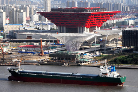 Photo taken on Sept. 20, 2009 shows the Axis and China Pavilion (red) in the World Expo Park in Shanghai, east China. Construction of "one axis and four pavilions", the Axis, China Pavilion, Theme Pavilion, Performing Arts Center and Expo Center, all entered internal construction phase recently. As the landmarks of the Expo Park, "one axis and four pavilions" will become permanent buildings in post-Expo Shanghai.