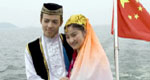 Newlyweds of 56 ethnic groups join group wedding