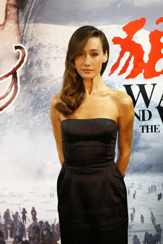 Cast member Maggie Q promotes the fantasy film 'The Warrior and the Wolf' at the Beijing premiere on September 20, 2009.