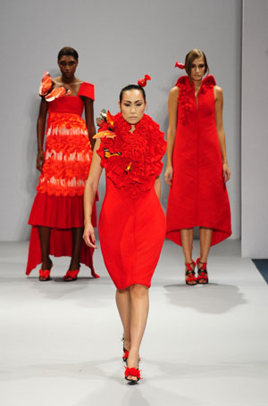 Models display creations of Chinese designer Xie Haiping during a show in London, September 21, 2009. Three designers from Shenzhen, south China, presented their catwalk shows in London on Monday, the fourth day of the London Fashion Week Spring/Summer 2010.