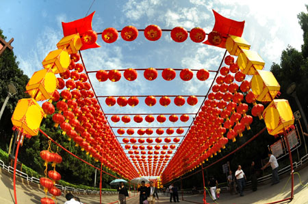 Red lanterns are seen at a park in Changsha, capital of central China's Hunan Province, Sept. 22, 2009. Parks and other scenic sites of the city are decorated to celebrate the 60th anniversary of the founding of the People's Republic of China which falls on Oct. 1. (Xinhua/Long Hongtao)