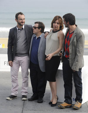 Co-directors Alvaro Pastor (L) and Antonio Naharro (R) pose with actor Pablo Pineda (2nd L) and actress Lola Duenas during a photocall at the Palacio Kursaal to promote "Yo Tambien" (Me Too) on the sixth day of the 57th San Sebastian Film Festival September 23, 2009. The feature film about Spain