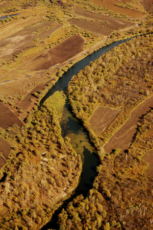 Aerial photo taken on Sept. 23, 2009 shows the scenery of the Greater Khingan range in north China's Inner Mongolia Autonomous Region. The local eco-environment has witnessed a great improvement thanks to the local government's efforts to restore the eco-system. [Wang Yongji/Xinhua]