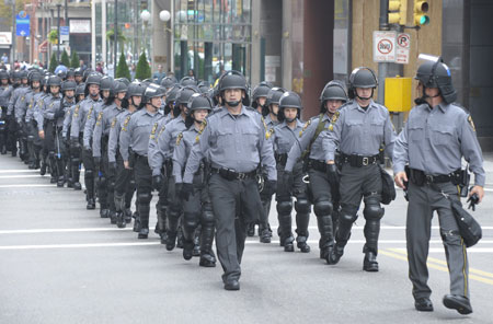 Pennsylvania State Troopers patrol on a street in Pittsburgh, Pennsylvania, the United States, Sept. 24, 2004. Pittsburgh beaf up its security for the two-day-long G20 Summit due to open on Sept. 24. (Xinhua/Qi Heng)