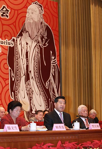 Jia Qinglin (L2 F), chairman of the National Committee of the Chinese People's Political Consultative Conference, addresses an international seminar to mark the 2,560th anniversary of the birth of Confucius, in Beijing, capital of China, Sept. 24, 2009. 