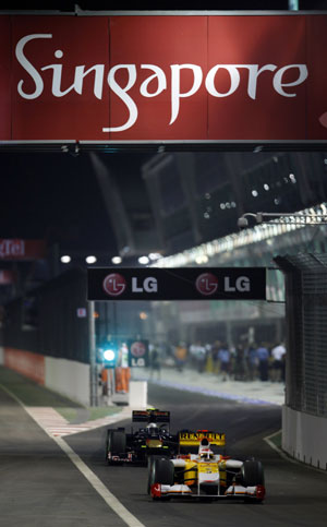 Renault Formula One driver Fernando Alonso of Spain drives out of the pit during the second practice session of the Singapore F1 Grand Prix at the Marina Bay street circuit September 25, 2009. 