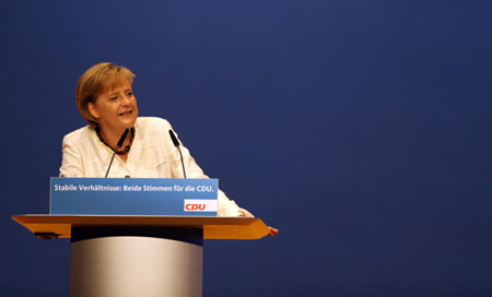 German Chancellor Angela Merkel attends a campaign rally of the Christian Democratic Union party (CDU) in Berlin, capital of Germany, Sept. 26, 2009. German will vote for general elections on Sunday. 