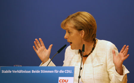 German Chancellor Angela Merkel attends a campaign rally of the Christian Democratic Union party (CDU) in Berlin, capital of Germany, Sept. 26, 2009. German will vote for general elections on Sunday. 