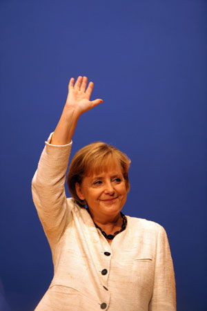German Chancellor Angela Merkel attends a campaign rally of the Christian Democratic Union party (CDU) in Berlin, capital of Germany, Sept. 26, 2009. German will vote for general elections on Sunday. 