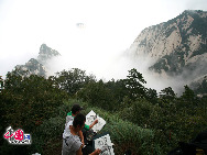 Mount Hua is located in the Shaanxi Province, about 100 kilometres east of the city of Xi'an, near the city Huayin. Hua was historically the location of several influential Taoist temples, and was known as a centre for the practice of traditional Chinese martial arts.[Photo by Li Wenke]