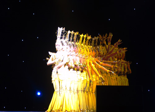 Twenty-one deaf dancers perform 'Avalokitesvara Bodhisattva' at the 'My Dream' show presented by China Disabled People's Performing Art Troupe in Yan'an, in north China's Shaanxi Province, on September 24, 2009.