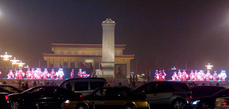 This picture taken on Sept. 28, 2009 shows Tiananmen Square is illuminated by two large LED screens. With the coming of the National Day of China, the nights of Beijing become more charming with many places and buildings illuminated by lights. (Xinhua/Gong Lei)