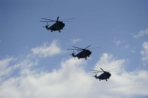 A formation of helicopters fly over the Tian'anmen Square in the celebrations for the 60th anniversary of the founding of the People's Republic of China, in Beijing, capital of China, Oct. 1, 2009. (Xinhua/Yang Guang)