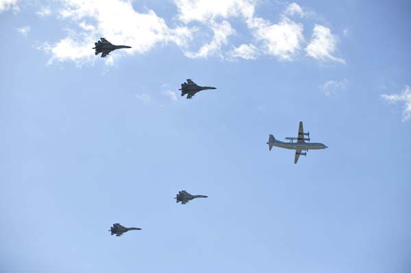  A formation of airborne warning and control plane and jet fighters flies over the Tian'anmen Square in the celebrations for the 60th anniversary of the founding of the People's Republic of China, in Beijing, capital of China, Oct. 1, 2009. (Xinhua/Yang Guang)