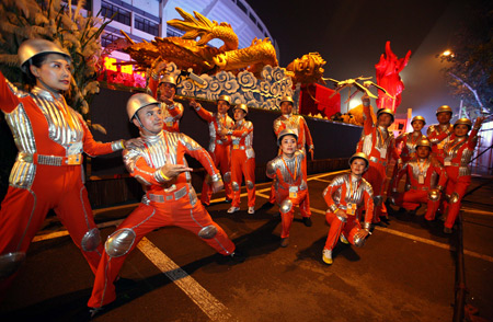 Performers of Heilongjiang Province rehearse before getting on the float at the Workers Stadium in the early morning in Beijing, on Oct. 1, 2009. China will celebrate on Oct. 1 the 60th anniversary of the founding of the People's Republic of China.