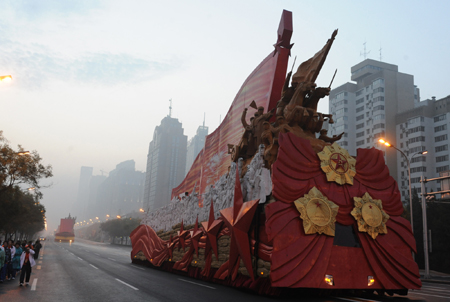 A float arrives at Chang'an avenue in the early morning in Beijing, on Oct. 1, 2009. China will celebrate on Oct. 1 the 60th anniversary of the founding of the People's Republic of China. 