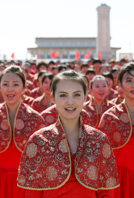 The chorus sings in the celebrations for the 60th anniversary of the founding of the People's Republic of China, on the Tian'anmen Square in central Beijing, capital of China, Oct. 1, 2009.