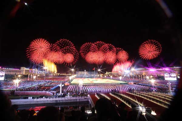 A grand evening gala is held to celebrate New China's 60th anniversary on Oct. 1 evening at the Tian'anmen Square in Beijing. Red, pink, white and orange fireworks shot up into the night sky, lighting up the Tian'anmen Rostrum.