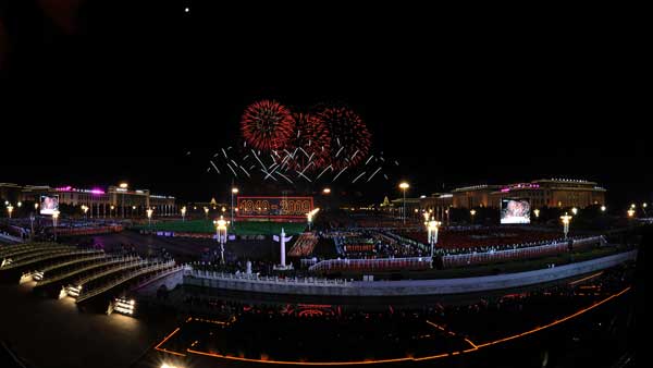 A grand evening gala is held to celebrate New China's 60th anniversary on Oct. 1 evening at the Tian'anmen Square in Beijing. Red, pink, white and orange fireworks shot up into the night sky, lighting up the Tian'anmen Rostrum. 